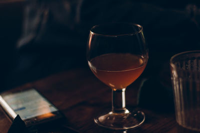 Close-up of wine glass on table