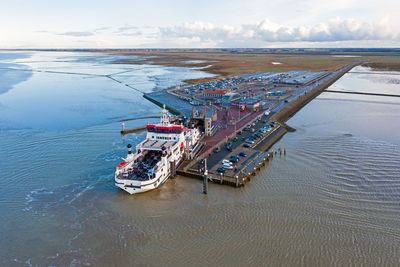 Aerial from the ferry from ameland arriving at holwerd in the netherlands