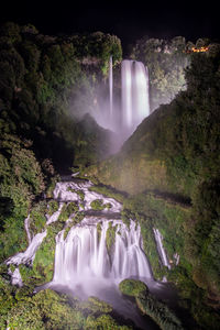 Scenic view of waterfall in forest