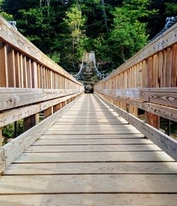 Footbridge amidst trees