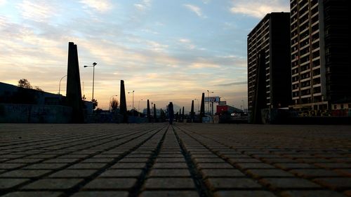 Buildings in city at sunset