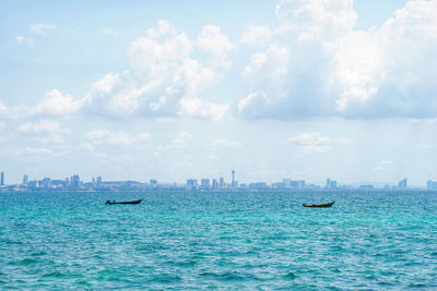 Panoramic view of sea against cloudy sky