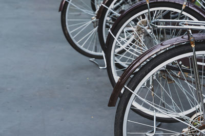 High angle view of bicycle wheels on road