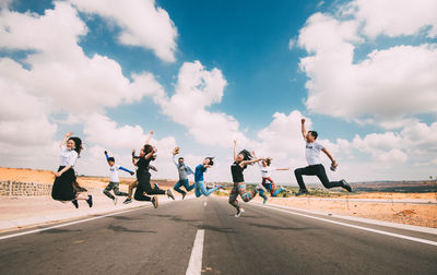 People on road against sky