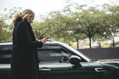 Side view of a woman in a car