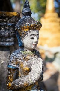 Statue against temple