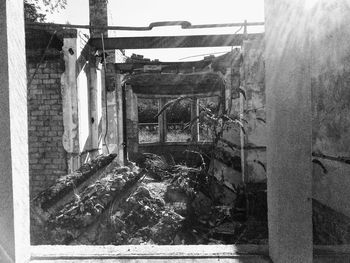 Abandoned building seen through window