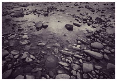Close-up of pebbles on beach