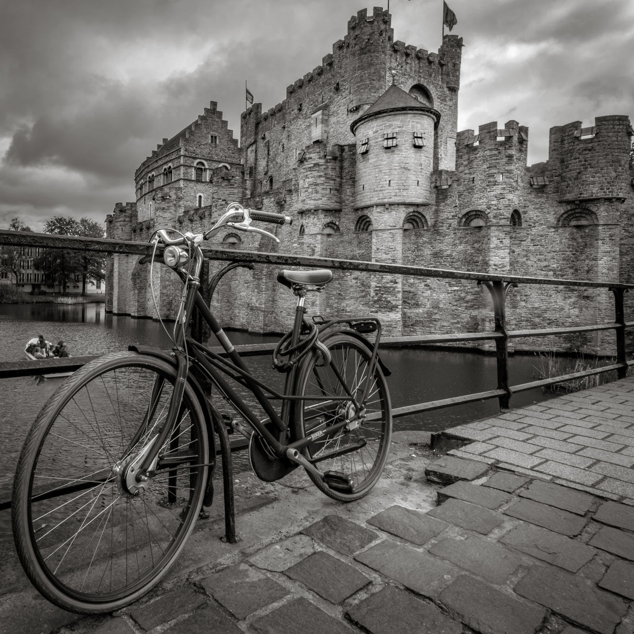 BICYCLES PARKED AGAINST BUILDING