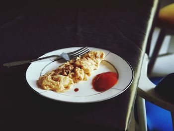 High angle view of breakfast in plate on table