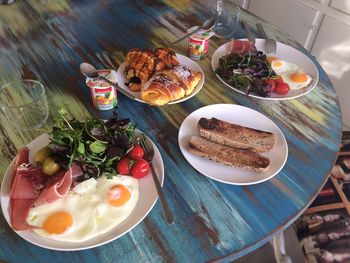 High angle view of breakfast served on table