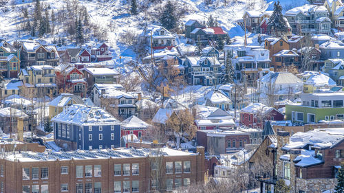 High angle view of buildings in city during winter