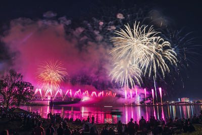 Firework display at night