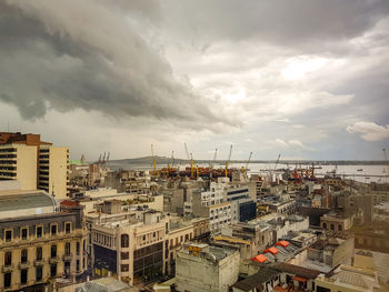 High angle view of montevideo dock in city against sky