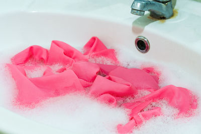 High angle view of pink water in bathroom