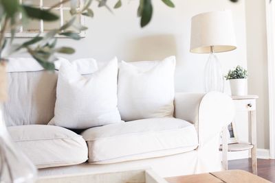 White sofa by table at home