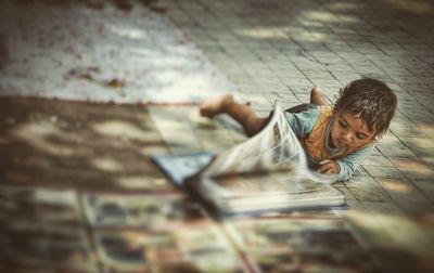 Portrait of young man sitting outdoors