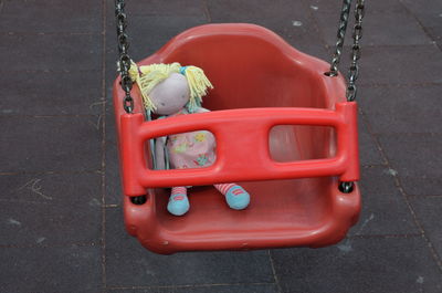 High angle view of toy doll on a playground