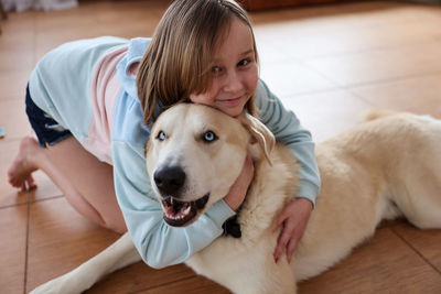 Portrait of girl with dog