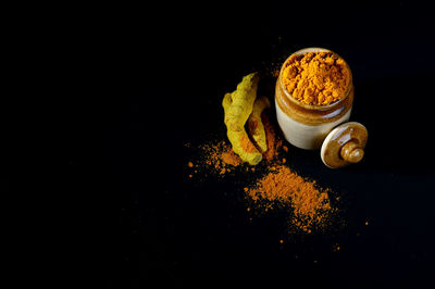 High angle view of coffee on table against black background