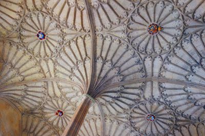 Low angle view of designed ceiling in building