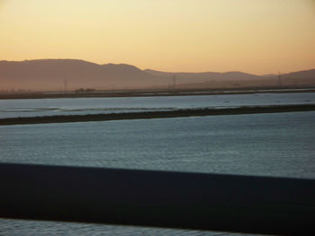 Scenic view of mountains at sunset