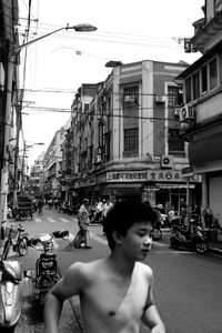 Woman standing in front of building