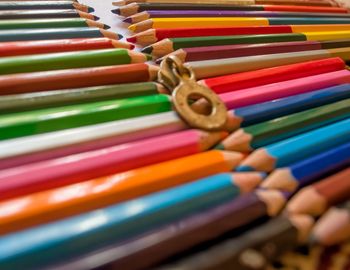 Close-up of colored pencils on table