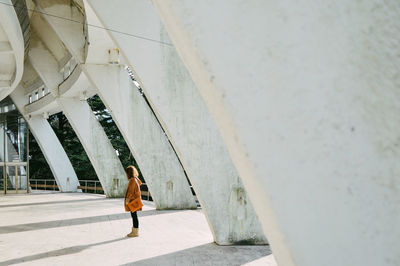 Full length of woman walking on walkway