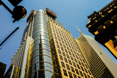 Low angle view of modern buildings against sky