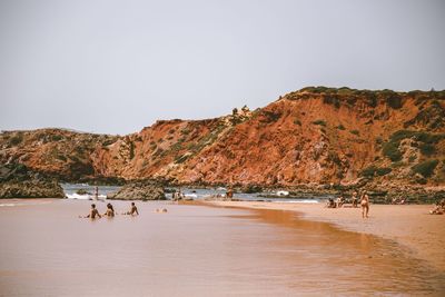 Scenic view of beach against clear sky