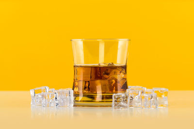Close-up of beer glass on table
