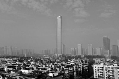 Modern buildings in city against sky