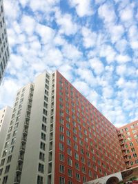 Low angle view of modern buildings against sky