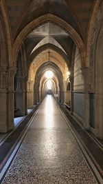 Illuminated corridor of building