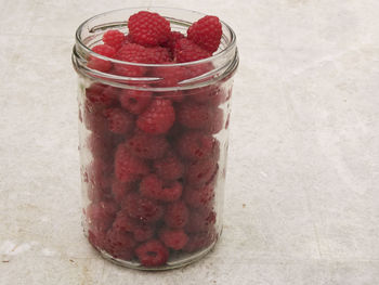 Close-up of strawberries in jar