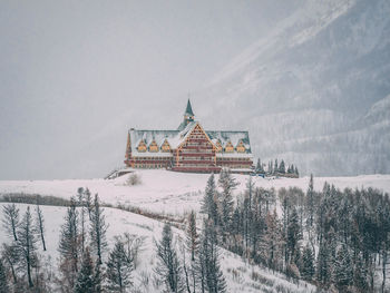 Panoramic view of buildings against sky during winter