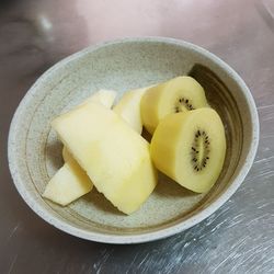High angle view of fruits in plate on table