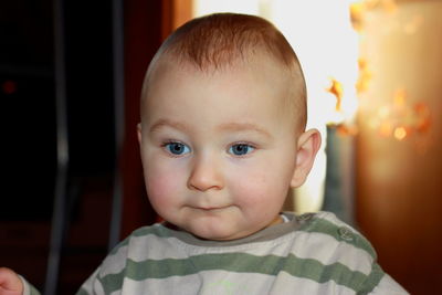 Portrait of cute baby at home