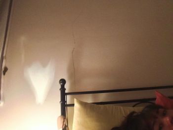 Close-up of illuminated lamp at home