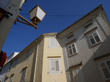 Low angle view of buildings against sky