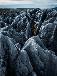 Rocks on land against sky