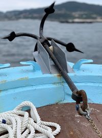 Close-up of rope tied to fishing boat