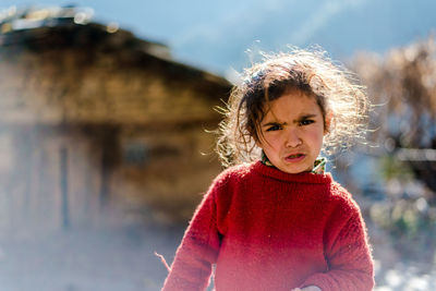 Portrait of girl standing in winter