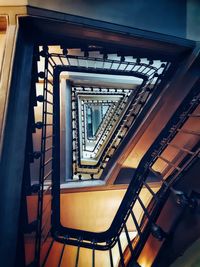 Low angle view of spiral staircase in building