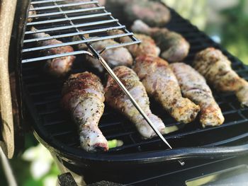 Close-up of meat on barbecue grill