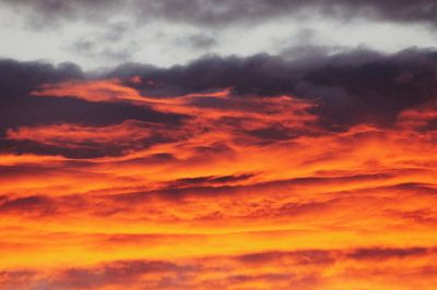 Low angle view of dramatic sky during sunset