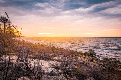 Scenic view of sea against sky during sunset