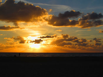 Scenic view of sea at sunset