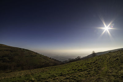 Scenic view of mountains against clear sky